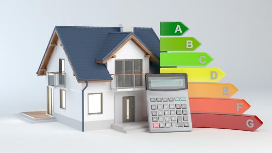 Model of house with calculator and energy efficiency rating