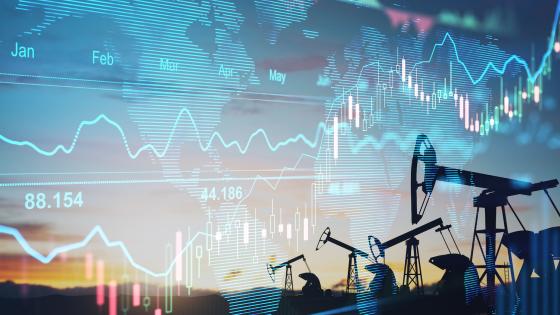 Charts with oil pumps in background