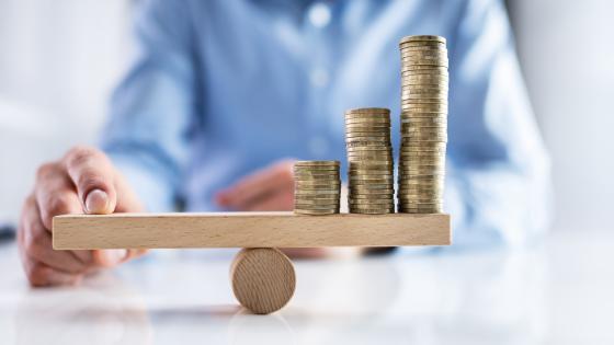 Coins balancing on see-saw