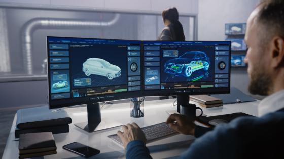 Engineers check aerodynamics of eco-friendly electric car in lab