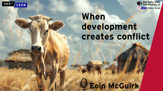 A cow stands in a dry field with thatched huts in the background, accompanied by the text "When development creates conflict" and "VoxTalks with Tim Phillips @ CEPR Policy Forum" and a microphone icon next to the name "Eoin McGuirk".