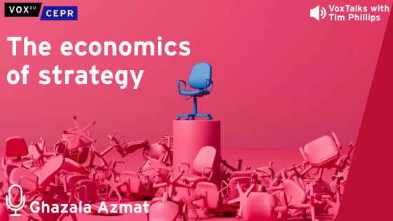 A single blue office chair sits elevated on a podium surrounded by overturned pink chairs, with the text "The economics of strategy" and "VoxTalks with Tim Phillips." With a microphone icon next to the name "Ghazala Azmat" 